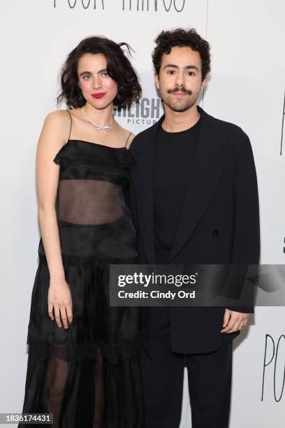 Margaret Qualley and Ramy Youssef attend the "Poor Things" premiere at DGA Theater on December 06, 2023 in New York City.