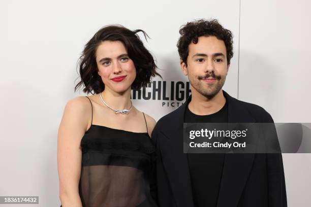 Margaret Qualley and Ramy Youssef attend the "Poor Things" premiere at DGA Theater on December 06, 2023 in New York City.
