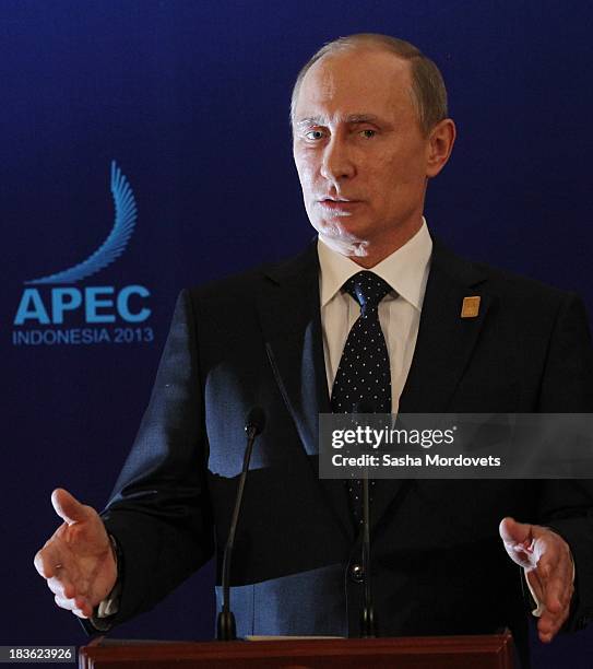 Russian President Vladimir Putin gives a press conference at the APEC Leaders Summit on October 8, 2013 in Denpadsar, Bali, Indonesia. US President...