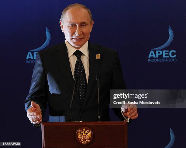 Russian President Vladimir Putin gives a press conference at the APEC Leaders Summit on October 8, 2013 in Denpadsar, Bali, Indonesia. US President...