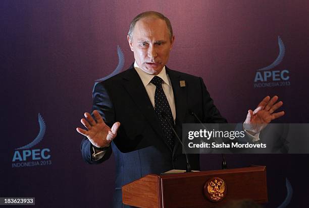 Russian President Vladimir Putin gives a press conference at the APEC Leaders Summit on October 8, 2013 in Denpadsar, Bali, Indonesia. US President...