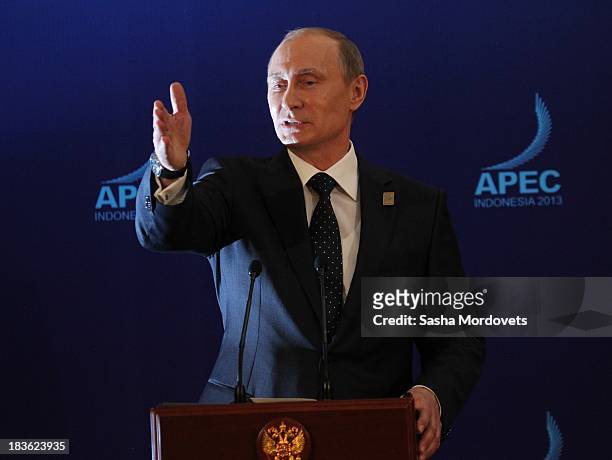 Russian President Vladimir Putin gives a press conference at the APEC Leaders Summit on October 8, 2013 in Denpadsar, Bali, Indonesia. US President...