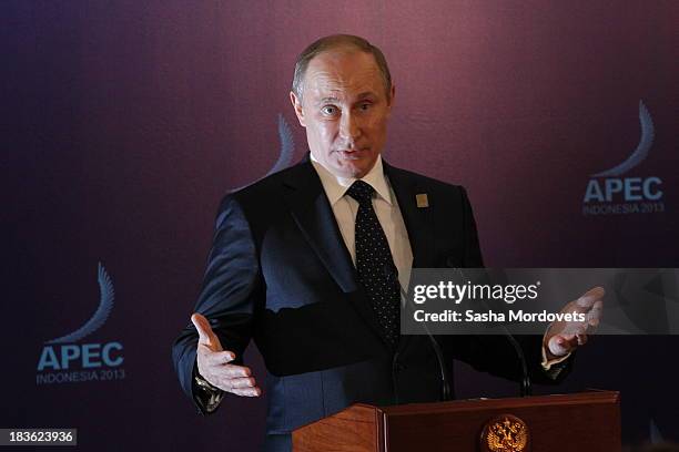 Russian President Vladimir Putin gives a press conference at the APEC Leaders Summit on October 8, 2013 in Denpadsar, Bali, Indonesia. US President...