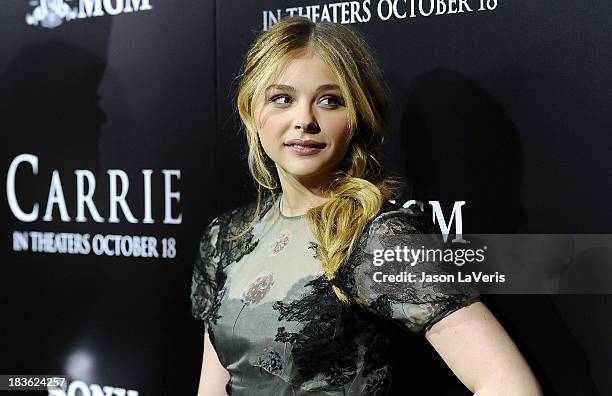 Actress Chloe Grace Moretz attends the premiere of "Carrie" at ArcLight Hollywood on October 7, 2013 in Hollywood, California.