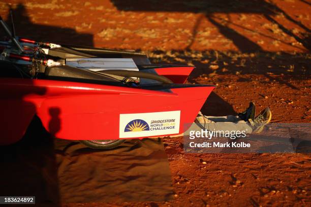The legs of a team member are seen as he prepares the RED Engine from the Solar Team Twente, University of Twente and Saxion in the Netherlands for...