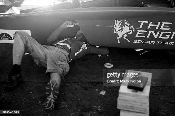 Team member prepares the RED Engine from the Solar Team Twente, University of Twente and Saxion in the Netherlands for the start of racing on Day 3...