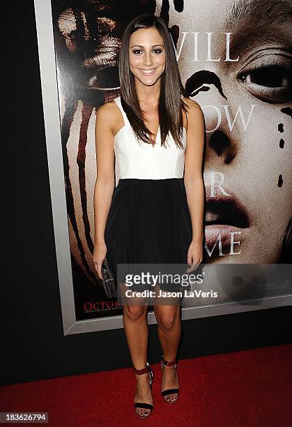 Actress Zoe Belkin attends the premiere of "Carrie" at ArcLight Hollywood on October 7, 2013 in Hollywood, California.