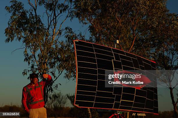 Team member watches the sunrise as they prepare the RED Engine from the Solar Team Twente, University of Twente and Saxion in the Netherlands at...