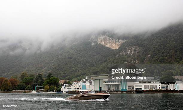 Riva Rivarama Super luxury yacht, manufactured by Ferretti Group, moves through the water near the company's shipyard on Lake Iseo in Sarnico, Italy,...