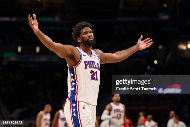 Joel Embiid of the Philadelphia 76ers reacts after scoring 50 points against the Washington Wizards during the second half at Capital One Arena on...