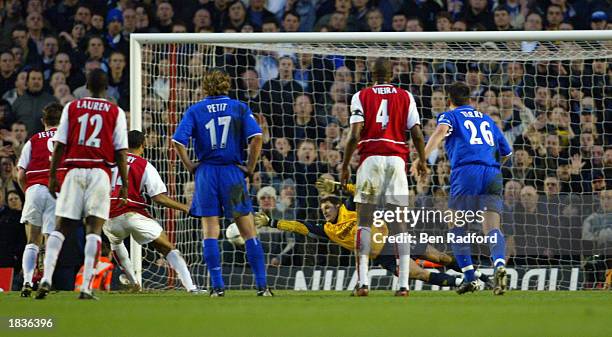 Goalkeeper Carlo Cudicini of Chelsea saves the penalty from Thierry Henry of Arsenal during the FA Cup Quarter Final match between Arsenal and...