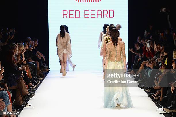 Models walk the runway at the Red Beard By Tanju Babacan show during Mercedes-Benz Fashion Week Istanbul s/s 2014 presented by American Express on...