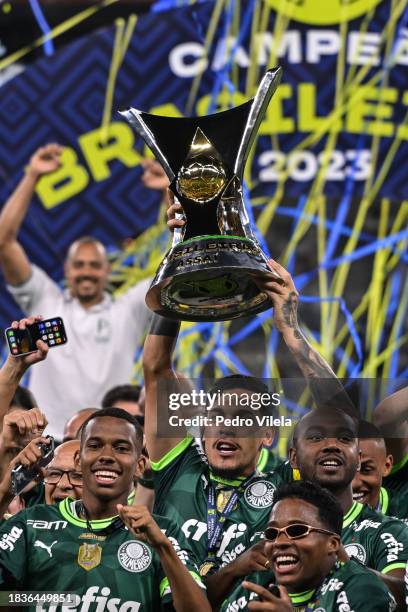 Players of Palmeiras celebrate with the champion trophy after winning the match between Cruzeiro and Palmeiras as part of Brasileirao 2023 at...