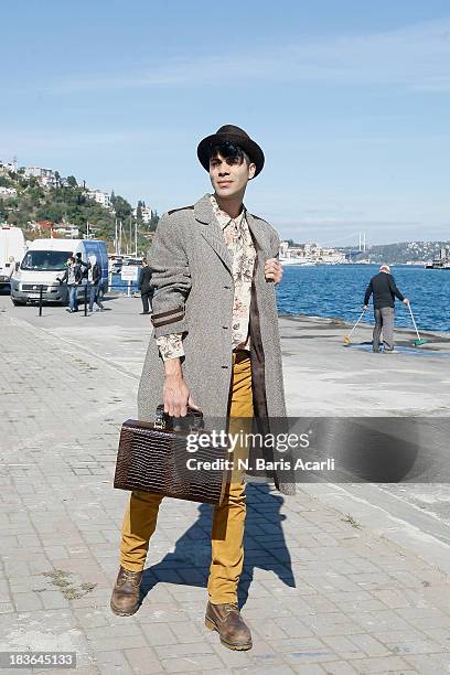 Onur Erol wears Eleni Vintage during Mercedes-Benz Fashion Week Istanbul s/s 2014 presented by American Express on October 7, 2013 in Istanbul,...