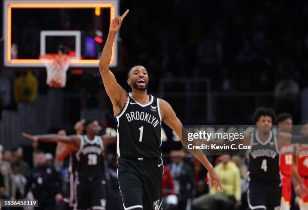 Mikal Bridges of the Brooklyn Nets reacts after their 114-113 win over the Atlanta Hawks at State Farm Arena on December 06, 2023 in Atlanta,...