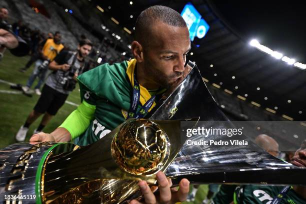 Weverton of Palmeiras celebrates with the champion trophy after winning the match between Cruzeiro and Palmeiras as part of Brasileirao 2023 at...