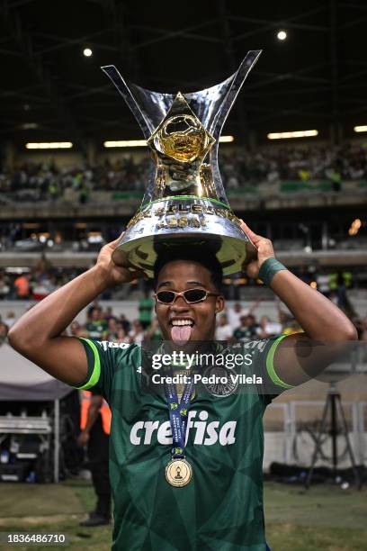 Endrick of Palmeiras celebrate with the trophy after winning during the match between Cruzeiro and Palmeiras as part of Brasileirao 2023 at Mineirao...