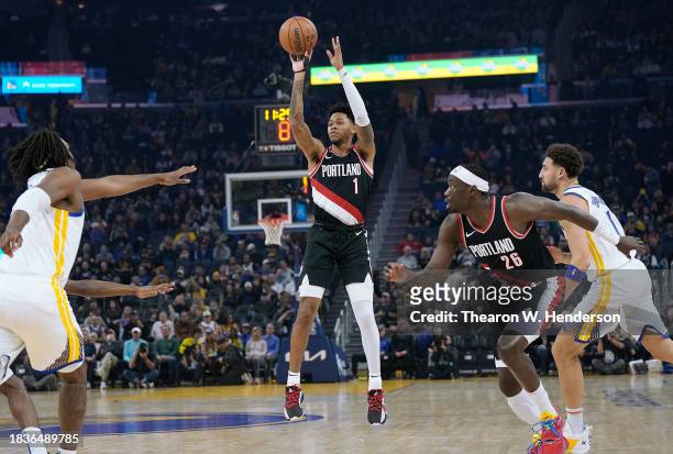 Anfernee Simons of the Portland Trail Blazers shoots a three-point shot against the Golden State Warriors during the first quarter at Chase Center on...