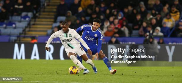 Plymouth Argyle's Bali Mumba shields the ball from Leicester City's James Justin during the Sky Bet Championship match between Leicester City and...