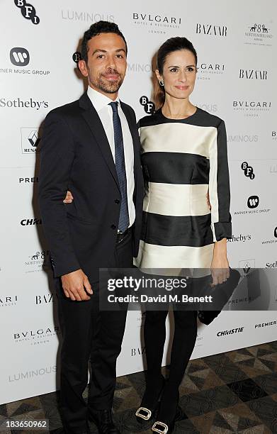 Nicola Giuggioli and Livia Firth attend a BFI Luminous Gala ahead of the London Film Festival at 8 Northumberland Avenue on October 8, 2013 in...