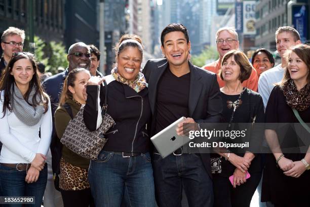 Mario Lopez hosts "Extra" in Times Square on October 8, 2013 in New York City.