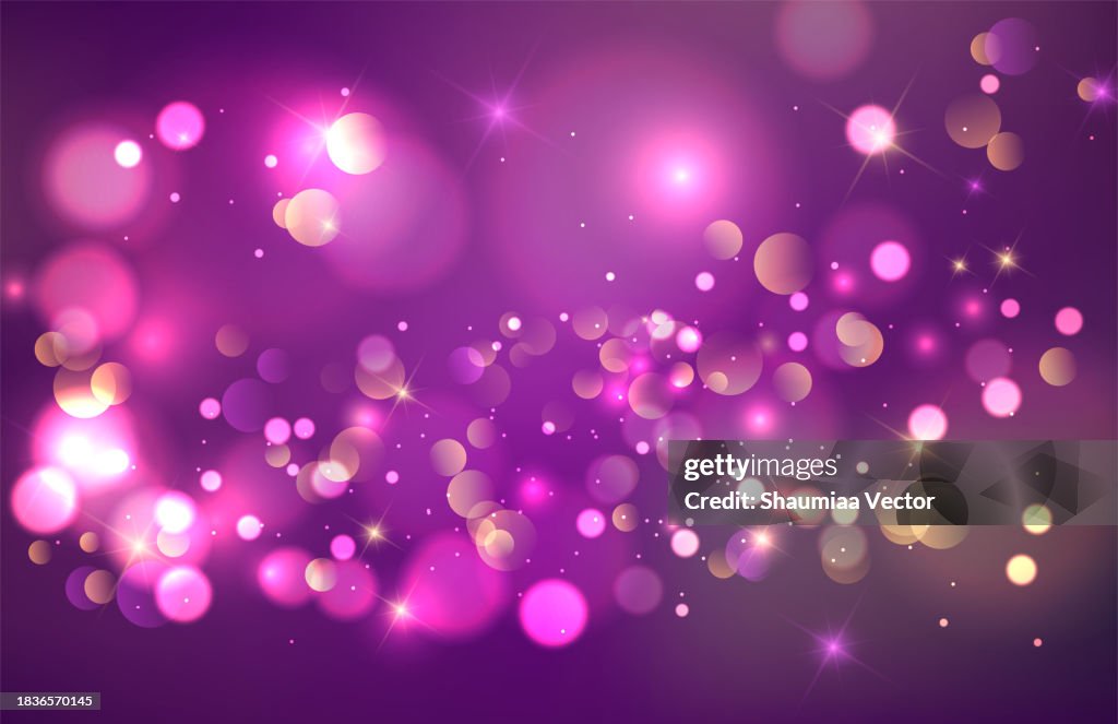 Abstract purple christmas bokeh lights and shiny sparkling background design
