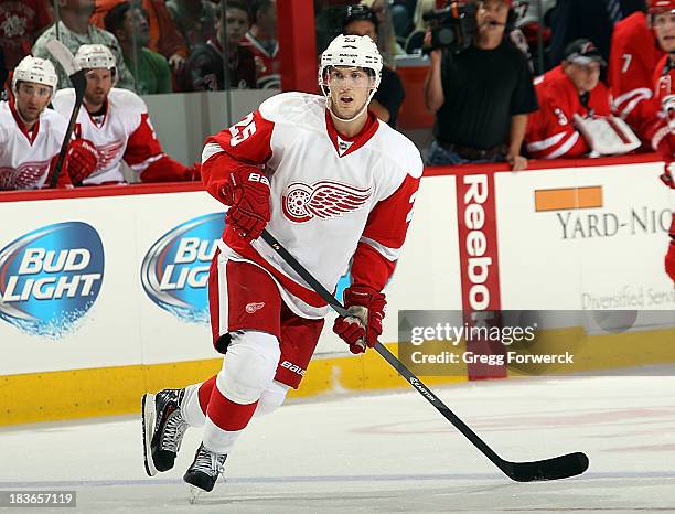 Cory Emmerton of the Detroit Red Wings skates for position on the ice against the Detroit Redwings during an NHL game on October 4, 2013 at PNC Arena...