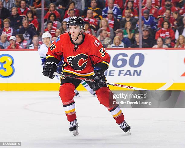 Ben Street of the Calgary Flames skates against the Vancouver Canucks during the Flames' home opening NHL game at Scotiabank Saddledome on October 6,...