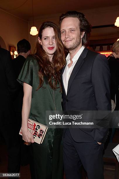 Julia Malik and August Diehl attend the 'Frau Ella' Party at Claerchens Ballhaus on October 8, 2013 in Berlin, Germany.