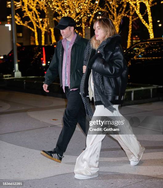 Robert Pattinson and Suki Waterhouse arrive at the afterparty for the screening 'Poor Things' at Avra on December 06, 2023 in New York City.