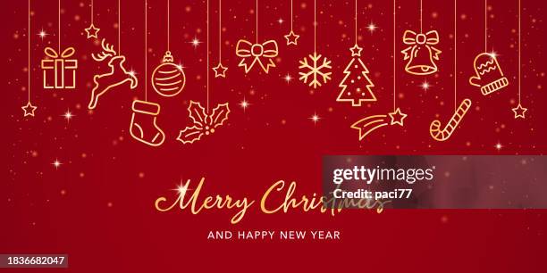 メリークリスマスと新年あけましておめでとうございますグリーティングカード赤い背景に金のアイコン - クリスマス点のイラスト素材/クリップアート素材/マンガ素材/アイコン素材
