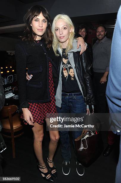 Alexa Chung and Cory Kennedy attend NYLON + Sanuk celebrate the October "It Girl" issue with cover star Alexa Chung at La Cenita on October 8, 2013...