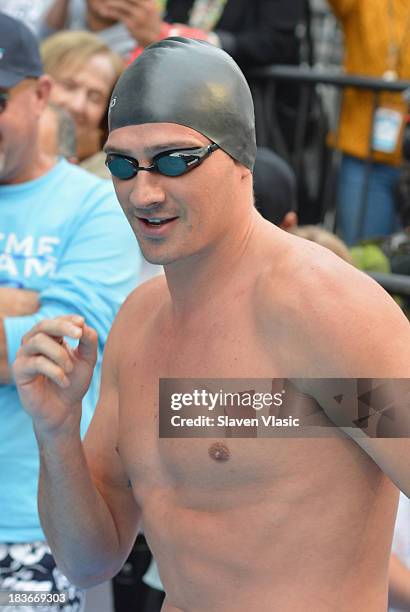 Olympic Gold Medalist Ryan Lochte attends day 1 of "Swim For Relief" Benefiting Hurricane Sandy Recovery at Herald Square on October 8, 2013 in New...