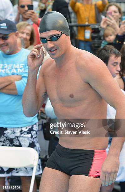 Olympic Gold Medalist Ryan Lochte attends day 1 of "Swim For Relief" Benefiting Hurricane Sandy Recovery at Herald Square on October 8, 2013 in New...