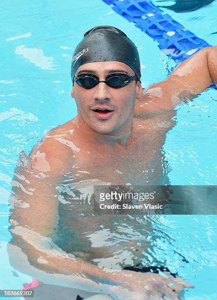 Olympic Gold Medalist Ryan Lochte attends day 1 of "Swim For Relief" Benefiting Hurricane Sandy Recovery at Herald Square on October 8, 2013 in New...