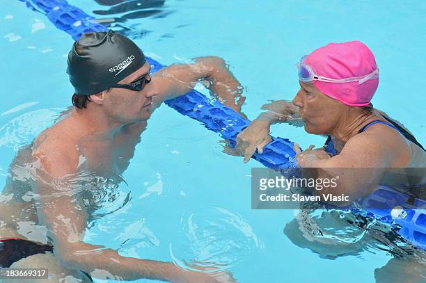 Long-distance swim legend Diana Nyad and Olympic Gold Medalist Ryan Lochte attend day 1 of "Swim For Relief" Benefiting Hurricane Sandy Recovery at...