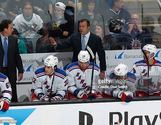 Alain Vigneault, coach of the New York Rangers reacts from the bench against the San Jose Sharks during an NHL game on October 8, 2013 at SAP Center...