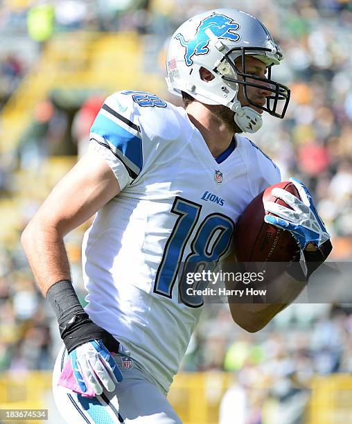 Kris Durham of the Detroit Lions warms up before the game against the Green Bay Packers at Lambeau Field on October 6, 2013 in Green Bay, Wisconsin.