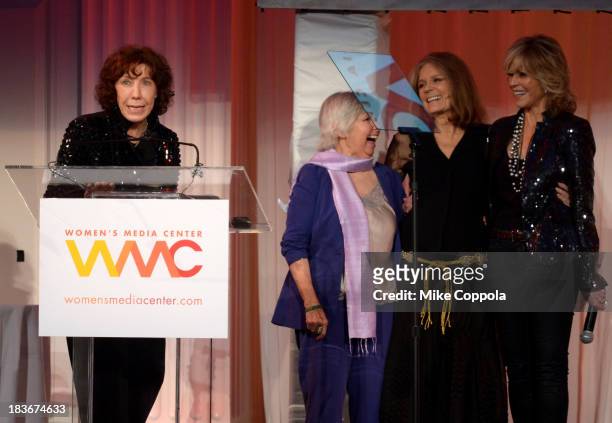 Lily Tomlin, Robin Morgan, Gloria Steinem and Jane Fonda speak onstage at the 2013 Women's Media Awards on October 8, 2013 in New York City.