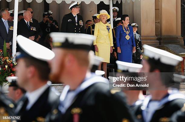 The Governor-General Quentin Bryce looks on as Navy personnel march down George Street on October 9, 2013 in Sydney, Australia. Over 4,000 personnel...