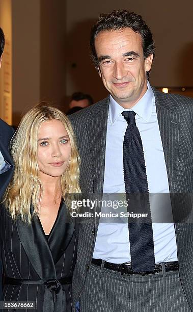 Mary-Kate Olsen and Olivier Sarkozy attend 2013 "Take Home A Nude" Benefit Art Auction And Party at Sotheby's on October 8, 2013 in New York City.