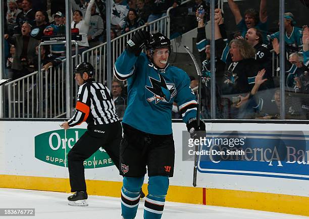 Logan Couture of the San Jose Sharks celebrates his goal against the New York Rangers during an NHL game on October 8, 2013 at SAP Center in San...