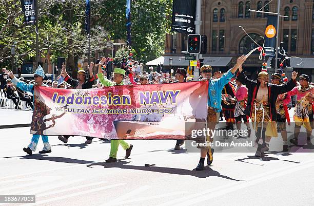 Indonesian Navy personnel are cheered on by the crowd as they march down George Street on October 9, 2013 in Sydney, Australia. Over 4,000 personnel...