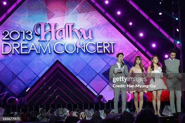 Seungyeon, Gyuri of South Korean girl group Kara and Jo Kwon, Seulong of South Korean boy band 2AM attend the 2013 Hallyu Dream Concert on October 5,...