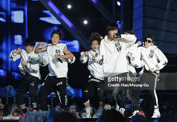 Members of South Korean boy band BTS perform onstage the 2013 Hallyu Dream Concert on October 5, 2013 in Gyeongju, South Korea.