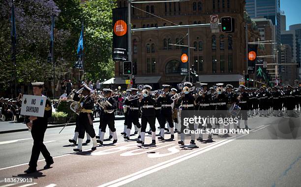 Indian sailors from INS Sahyadri warship march past the Sydney Town Hall during a combined navies parade on George Street in the central business...
