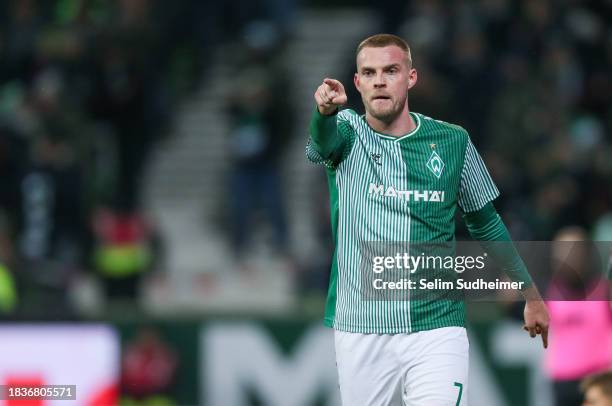 Marvin Ducksch of Bremen celebrate their teams second goal scoring during the Bundesliga match between SV Werder Bremen and FC Augsburg at Wohninvest...