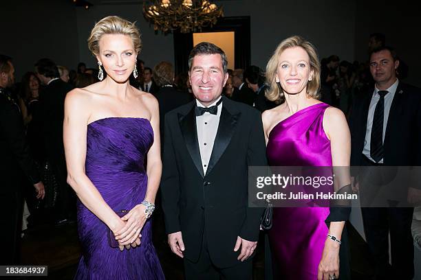 Ambassador to France Charles H. Rivkin , his wife Susan Tolson and Princess Charlene of Monaco attend the presentation of the Ralph Lauren Fall 13...