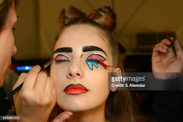 Model is seen backstage at the Maybelline New York By DB Berdan show during Mercedes-Benz Fashion Week Istanbul s/s 2014 presented by American...