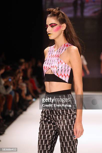 Model walks the runway at the Maybelline New York By DB Berdan show during Mercedes-Benz Fashion Week Istanbul s/s 2014 presented by American Express...